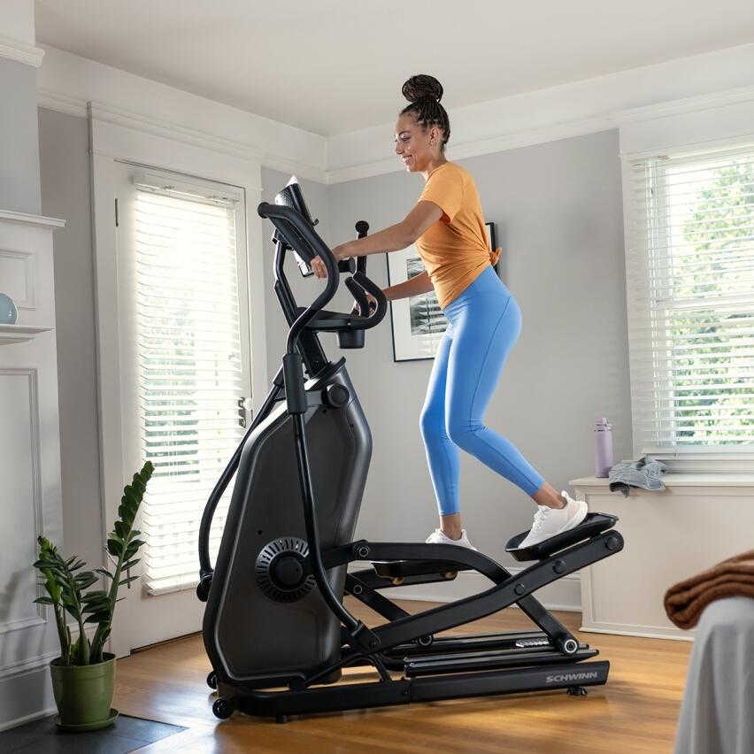 SCHWINN FITNESS Elíptica 590E - Zancada 51cm, Inclinación motorizada, 25 niveles y JRNY
